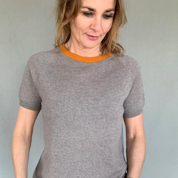ochre with light pink ribbed neck Knitwear for women - handmade in Italy Short-sleeved knit blouse "With a Twist no. 1 dark sand" from Hanne Linding. Danish design in quality knit.