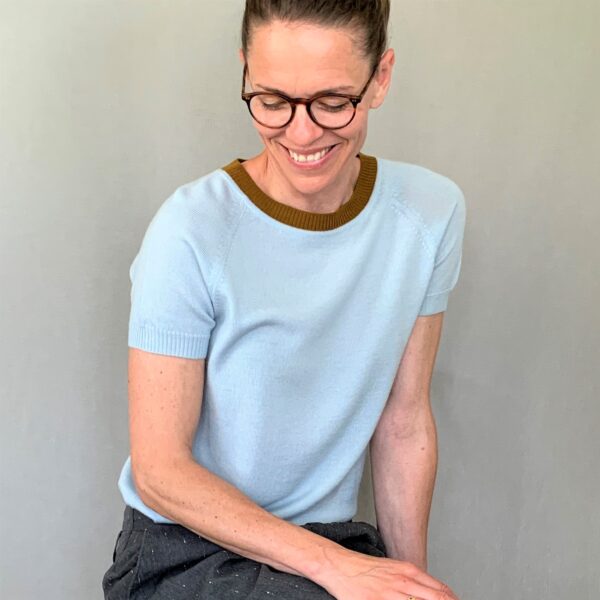 light blue t-shirt in thin merino wool Knitwear for women - handmade in Italy Short-sleeved knit blouse With a Twist no. 1 light blue. Light blue knit from Hanne Linding, Danish design.